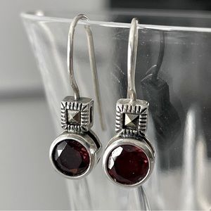 Garnett and silver drop earrings.